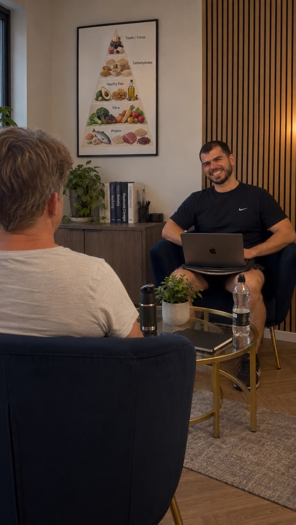 Personal trainer supporting a client